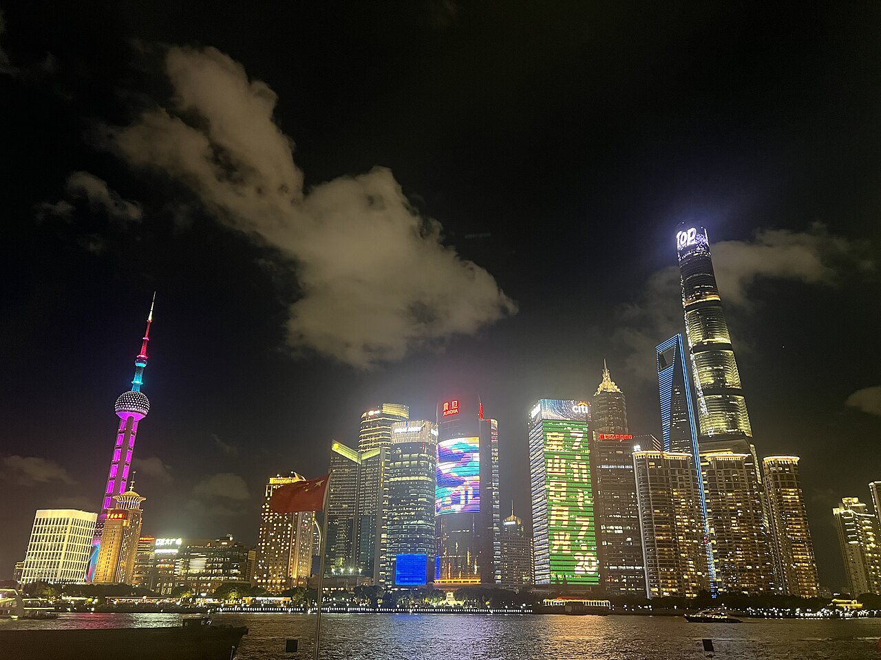Night view of Pudong's buildings in Shanghai, seen from the Bund in 2025.